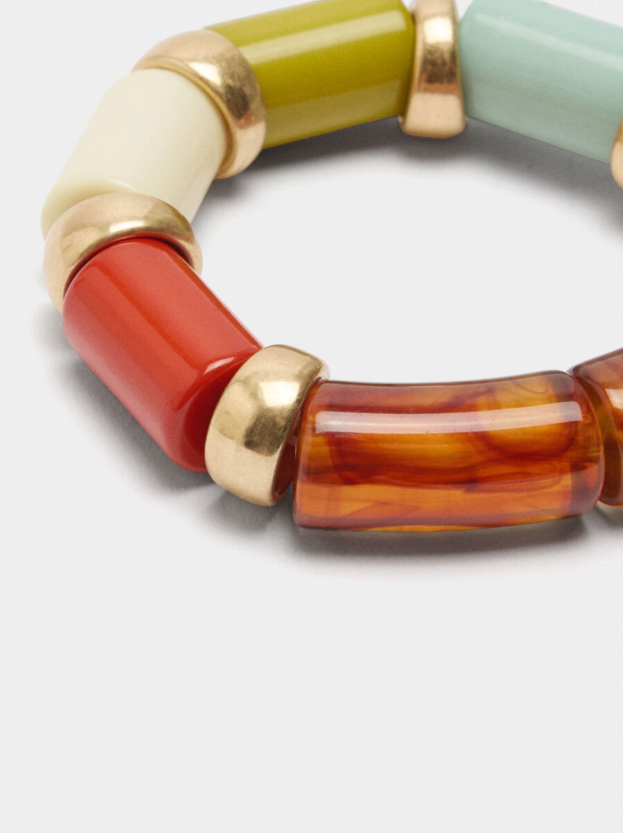 Elastic bracelet with cylindrical beads