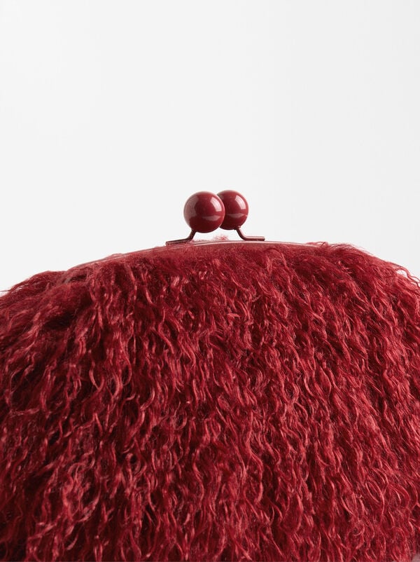 Faux fur effect handbag