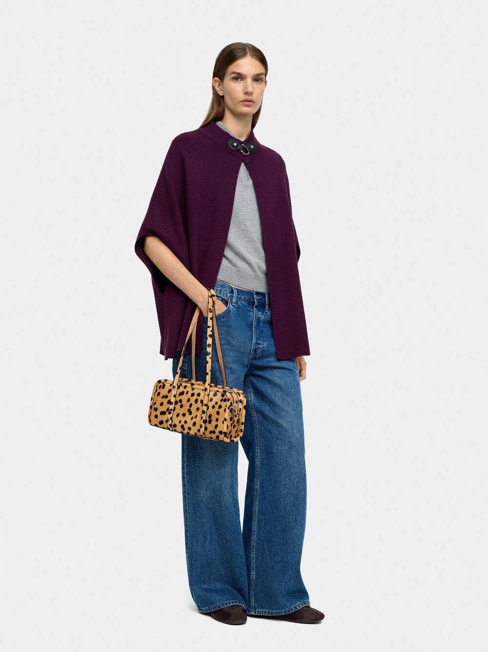 Knit poncho with high neck