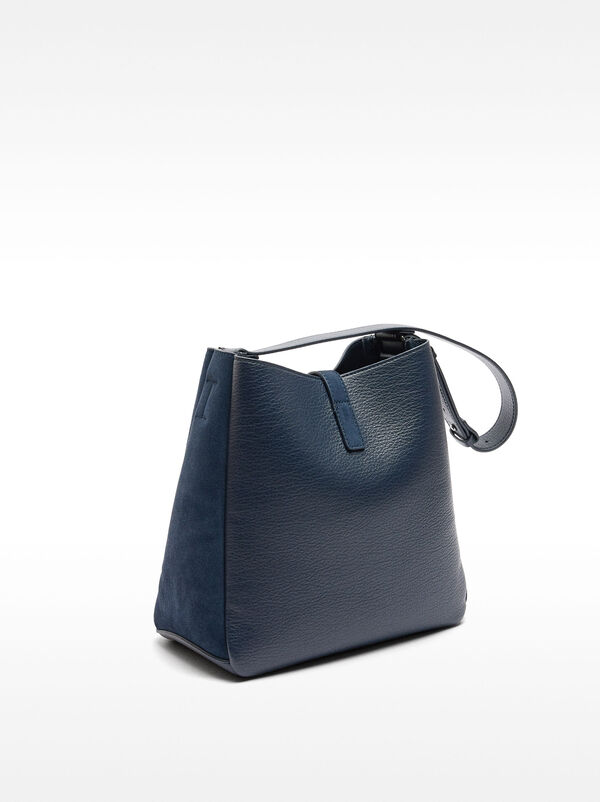 Shoulder bag with leather