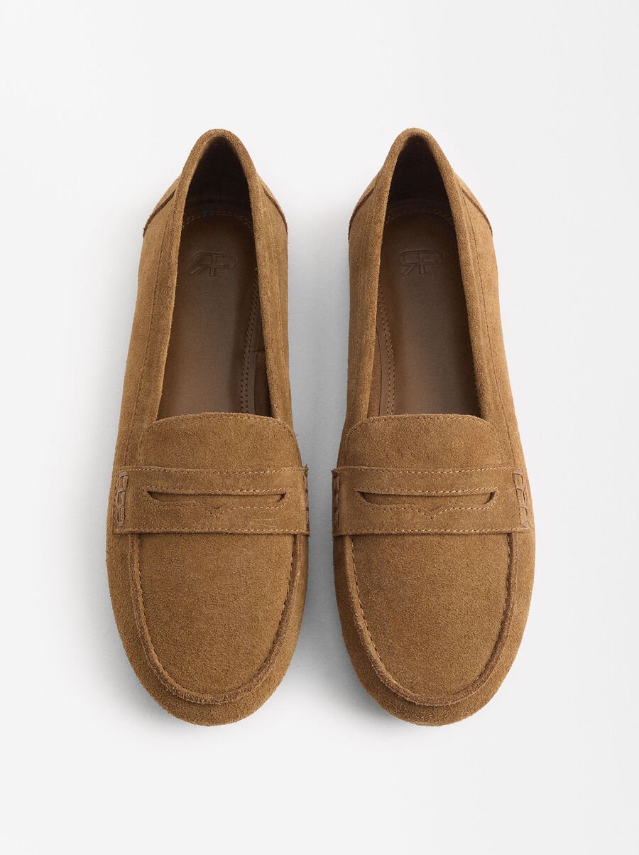 Mocasines de piel con pespuntes