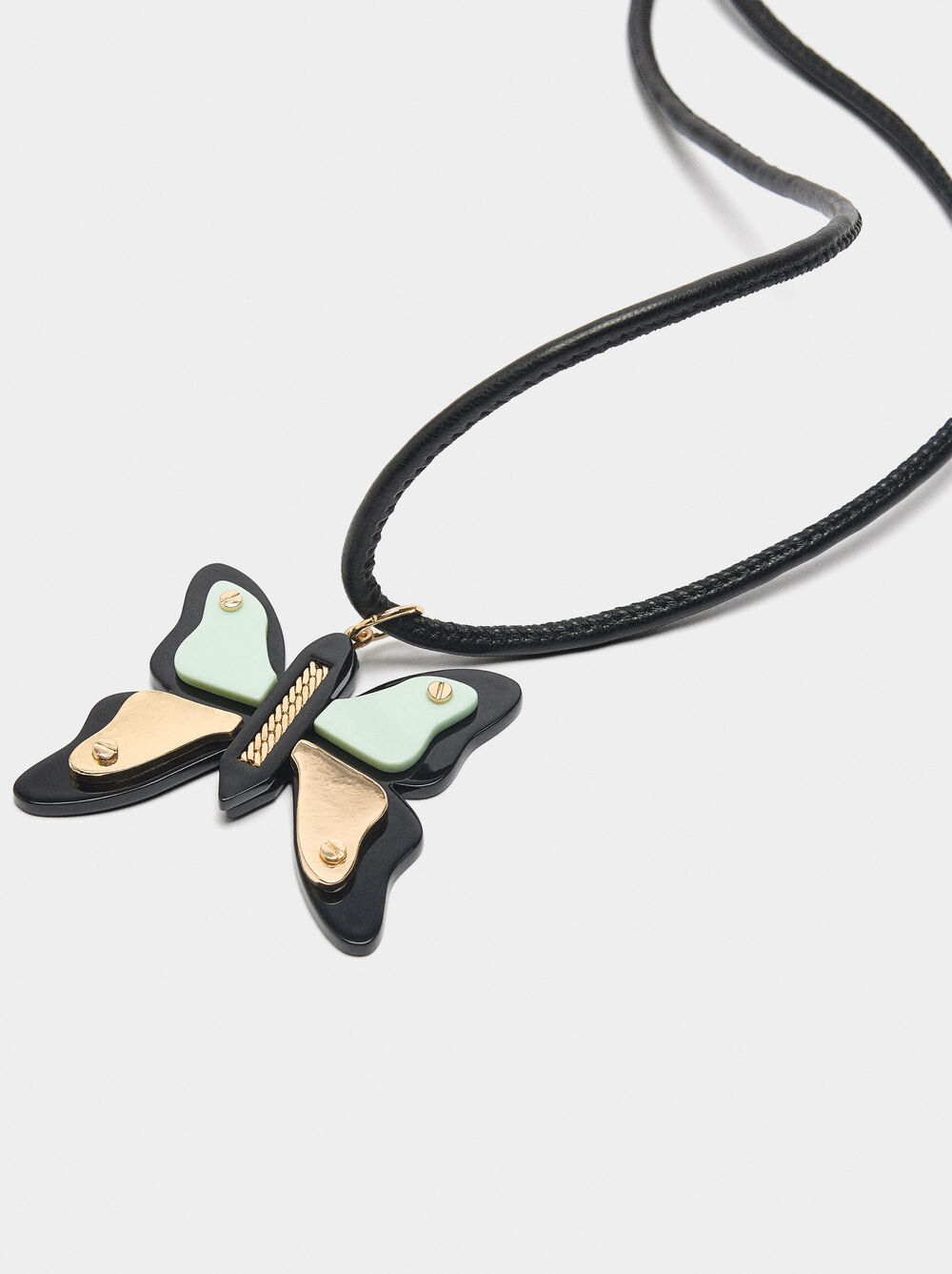 Cord necklace with butterfly pendant