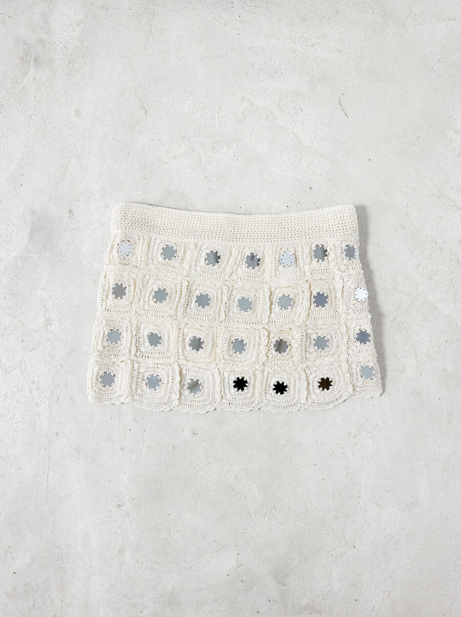 Short knitted skirt with mirror detail