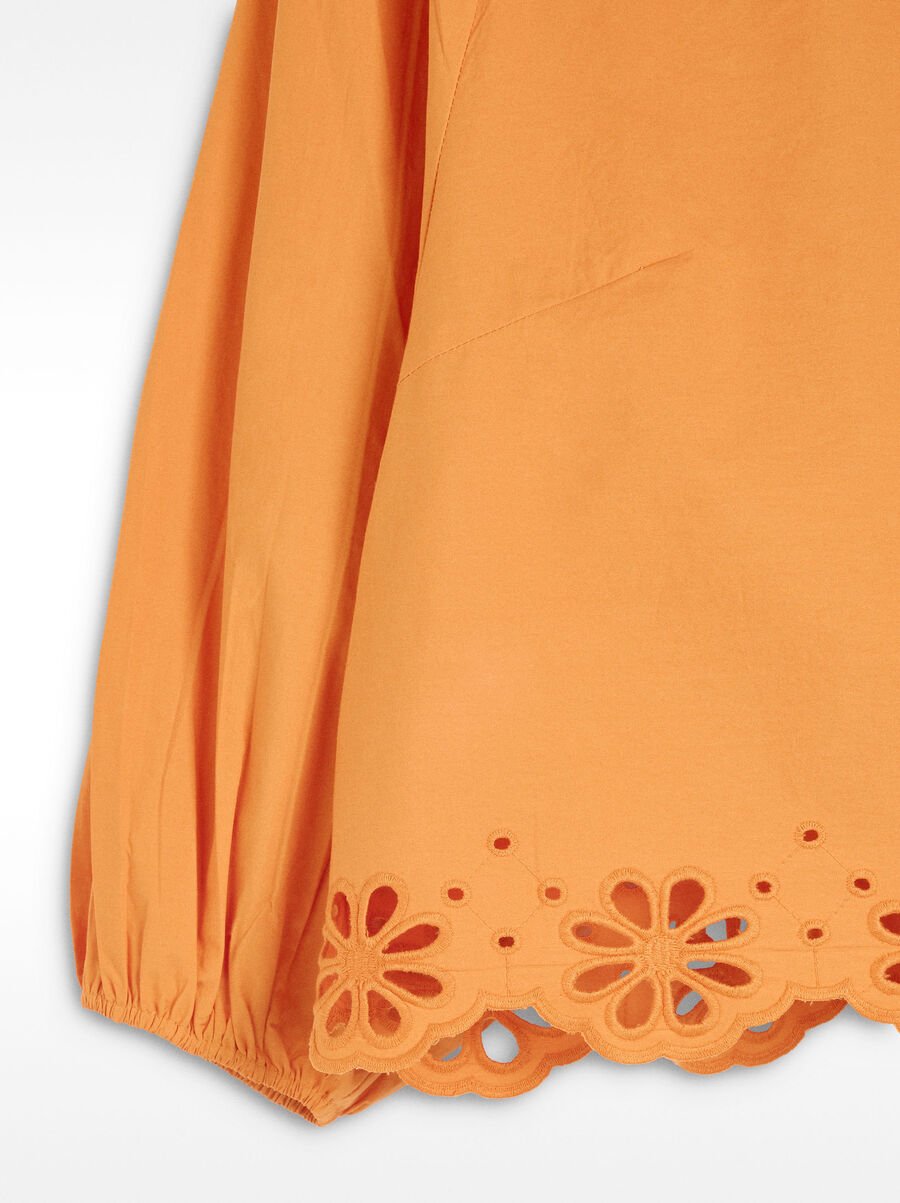 Blouse with pierced embroidery