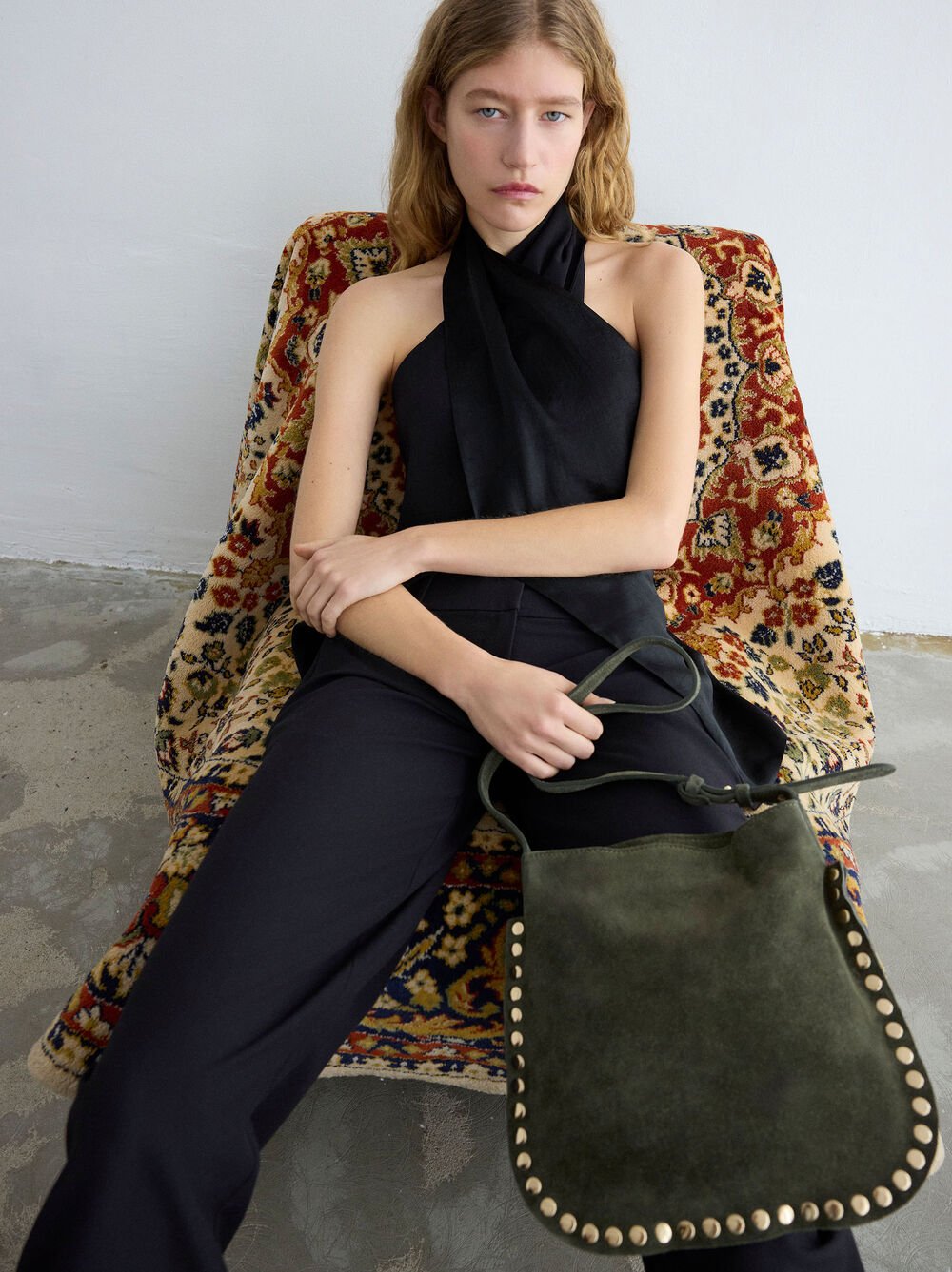 Sac bandoulière en cuir avec clous