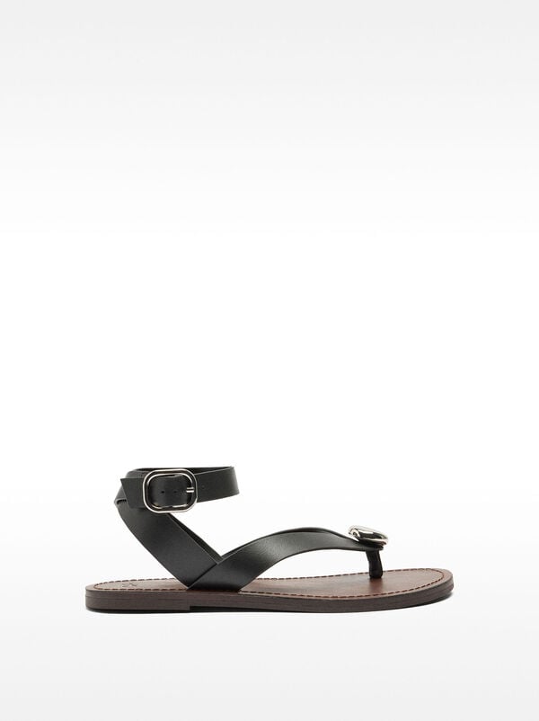 Leather flat sandals with metallic detail