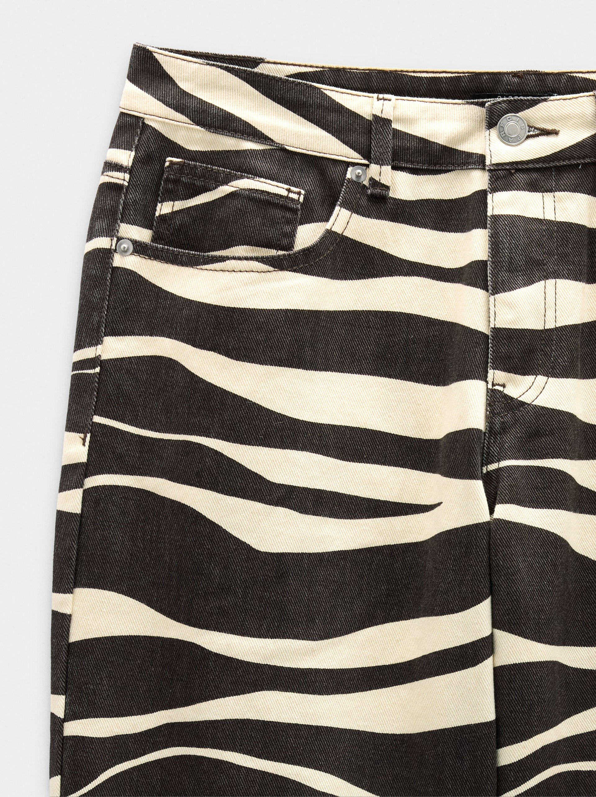 Denim printed trousers with animal print image number 5.0