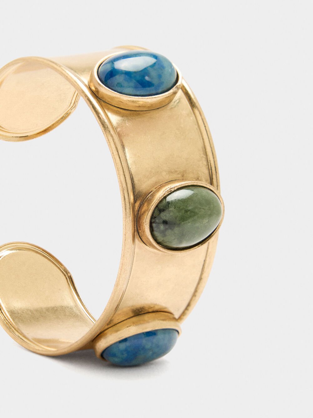 Wide bracelet with stones