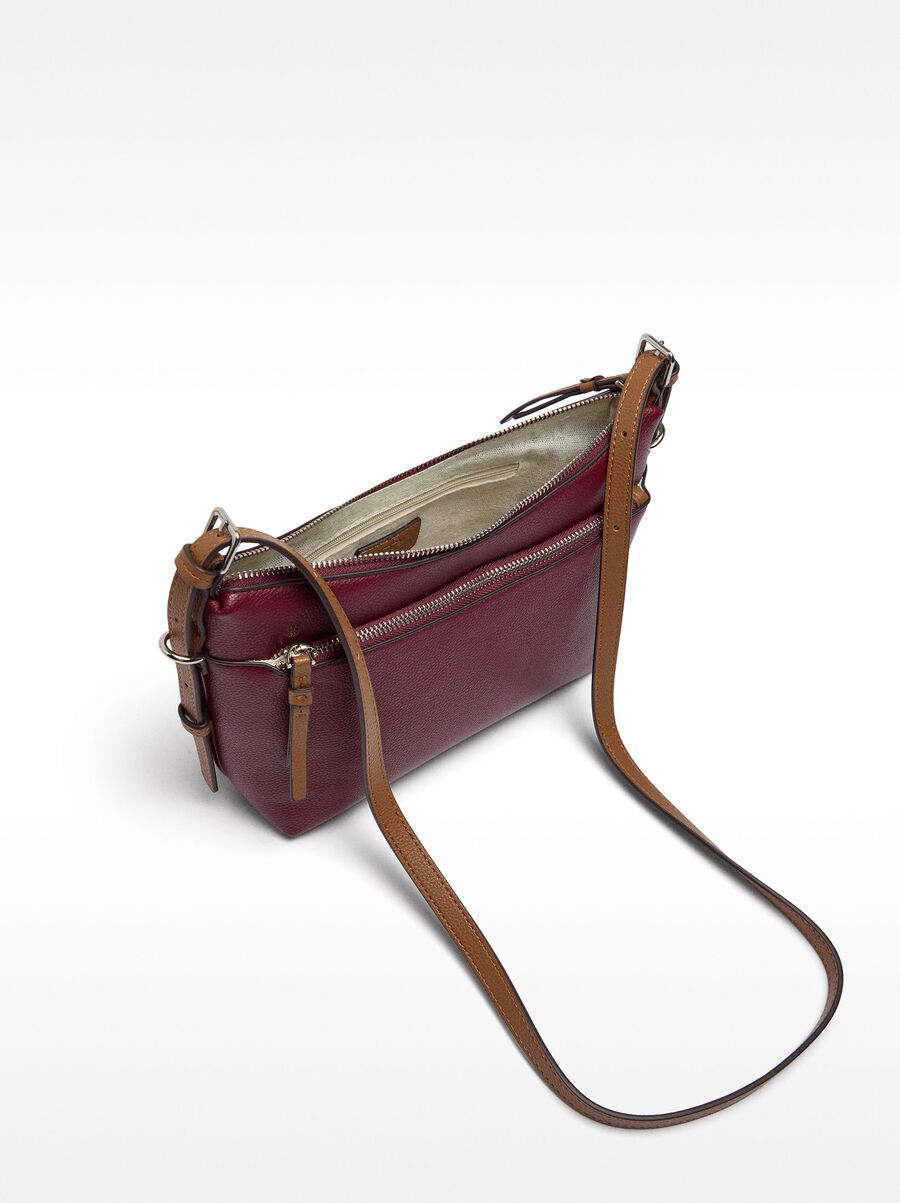Crossbody bag with exterior pocket