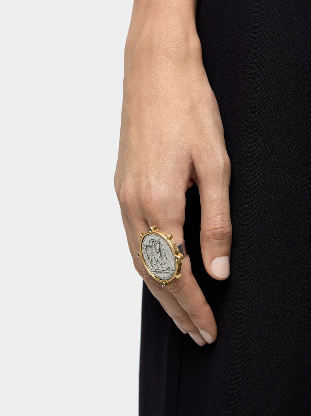 Anell amb moneda bicolor