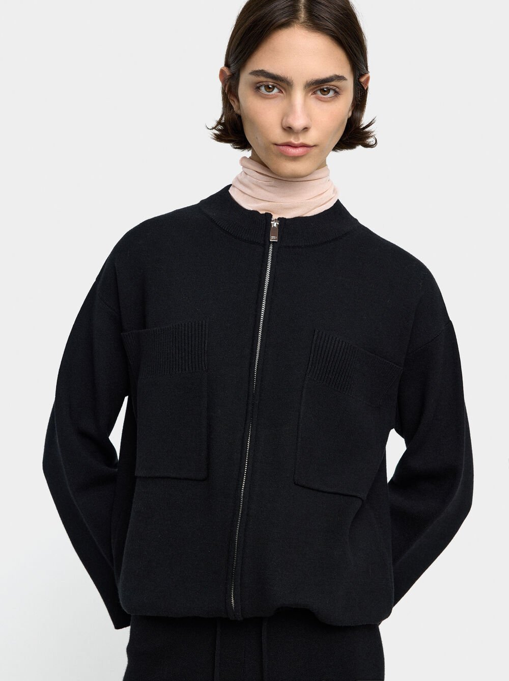 Knit cardigan with zipper closure