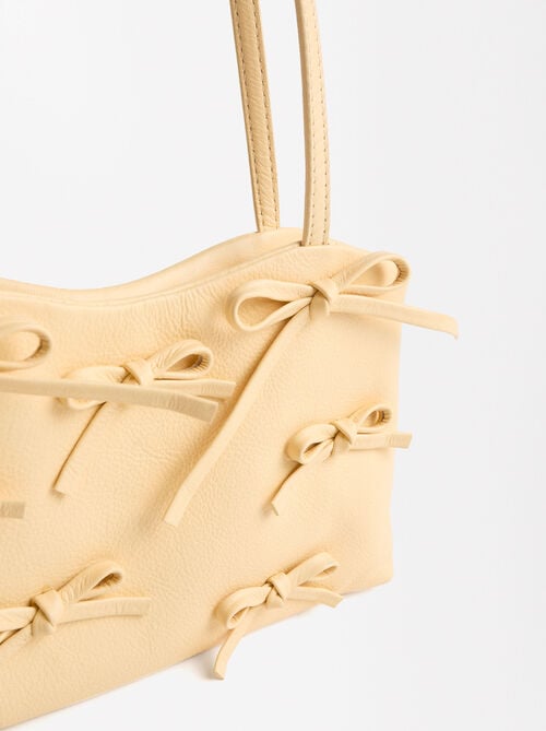 Shoulder bag with bows