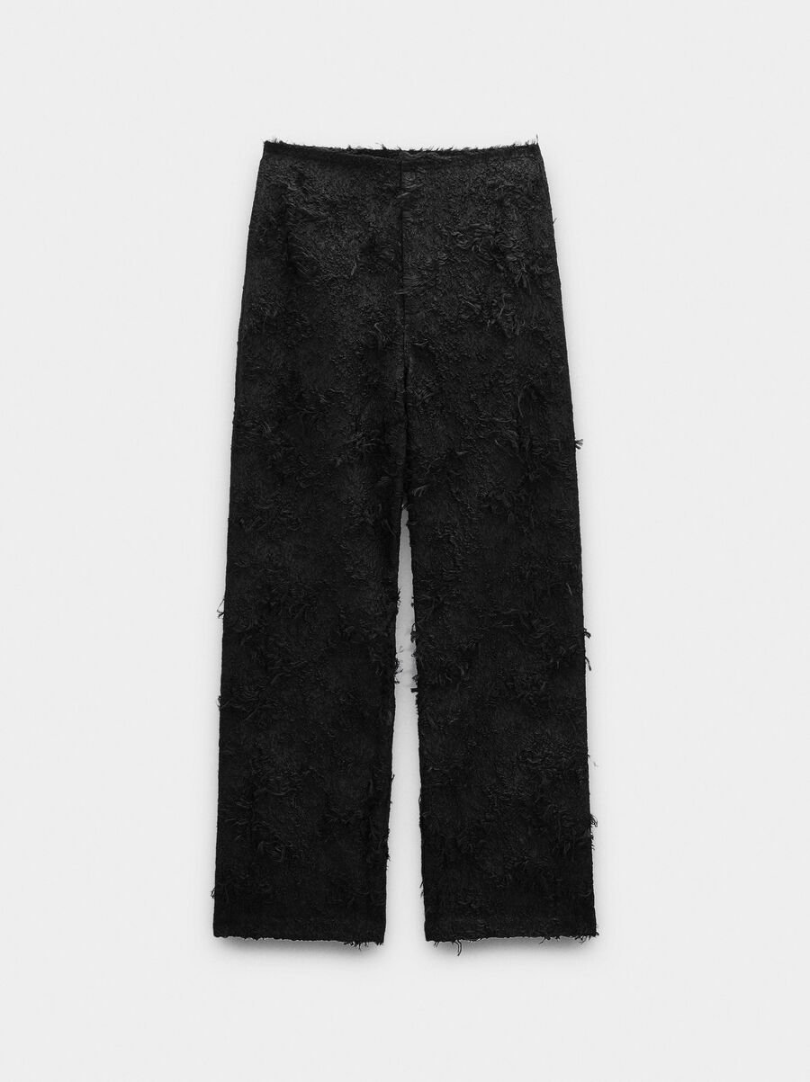 Trousers with cotton texture