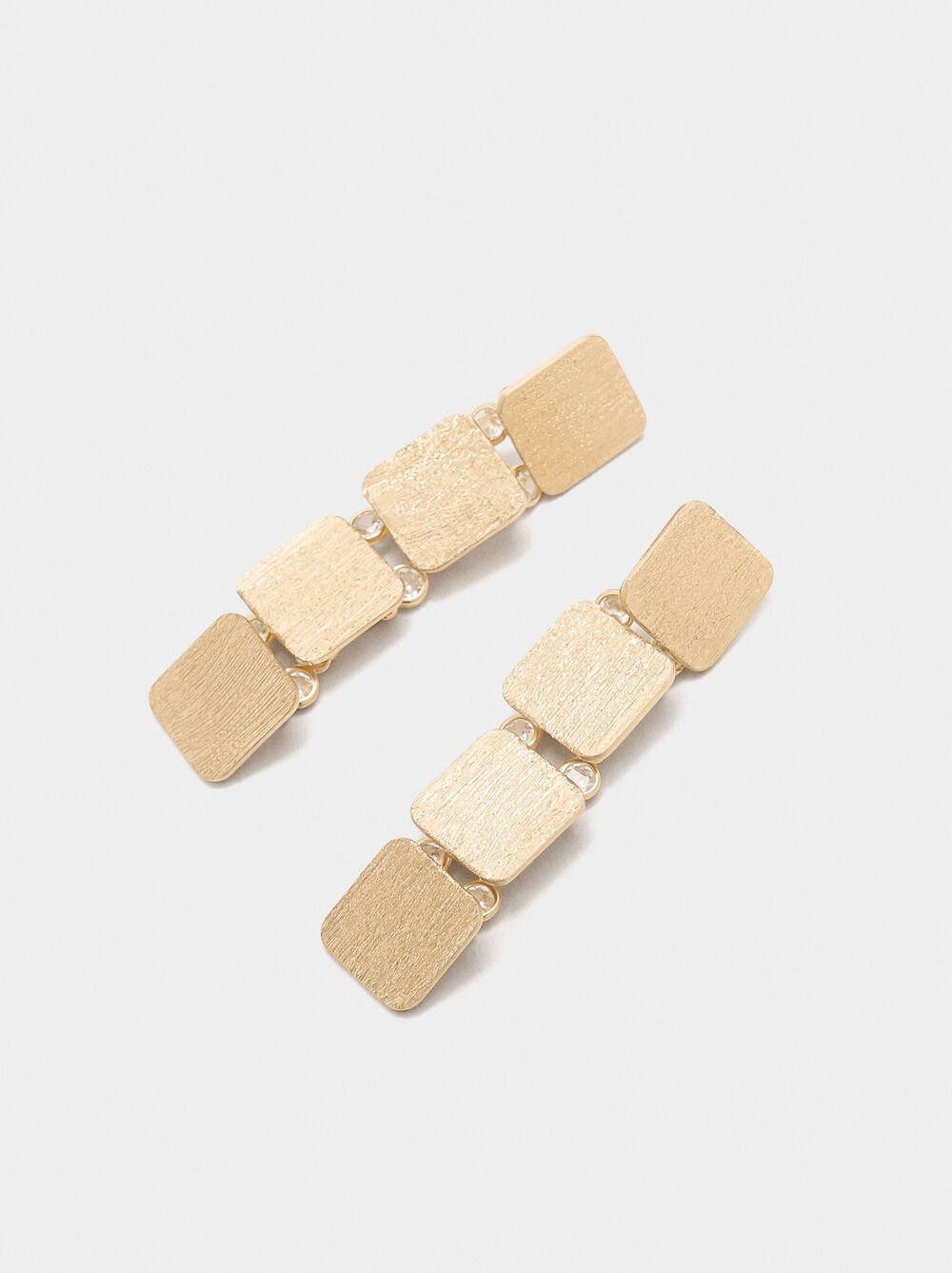 Lange Ohrringe mit Quadraten und Zirkonien