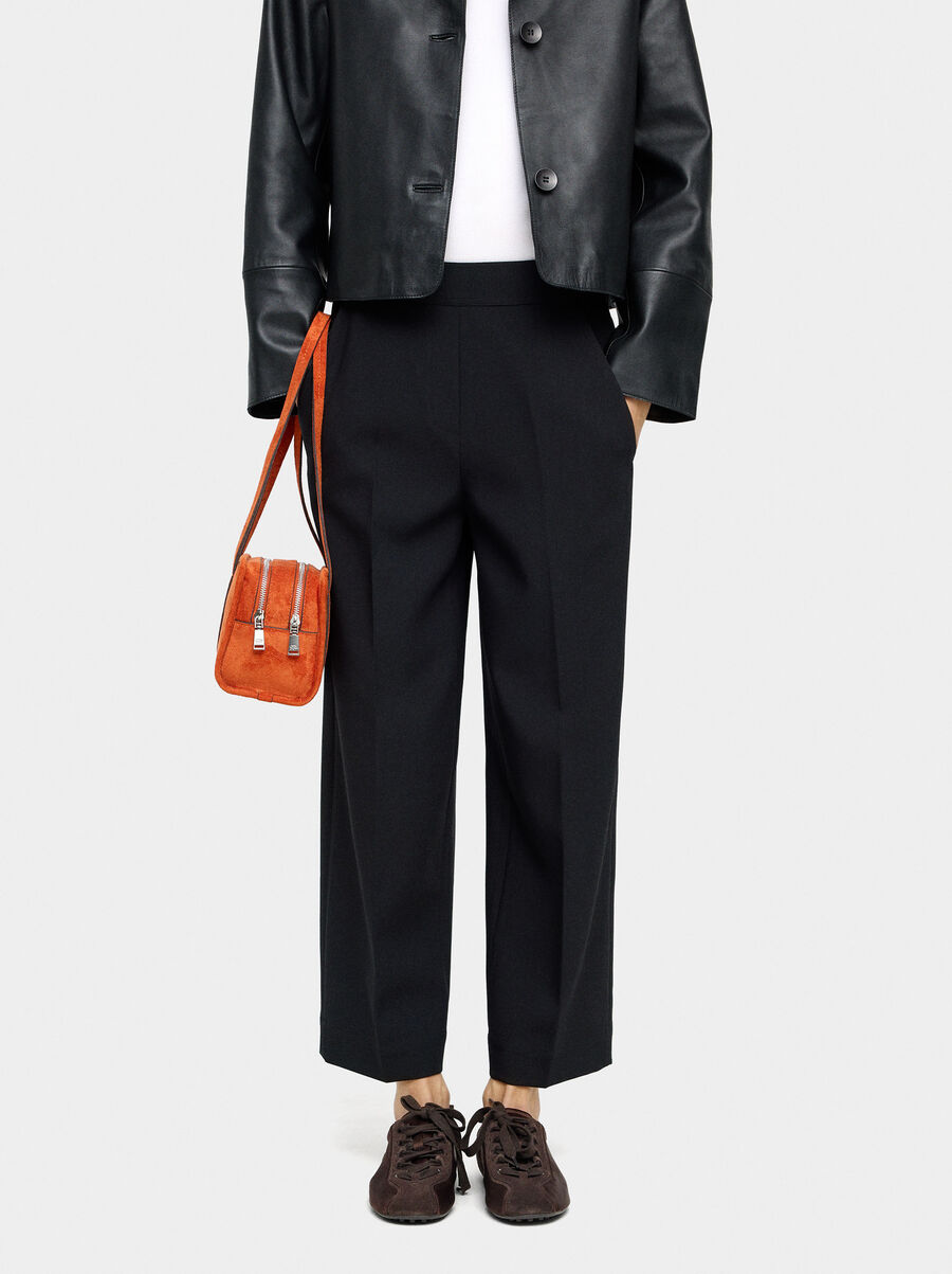 Pantalón fluidos con bolsillos