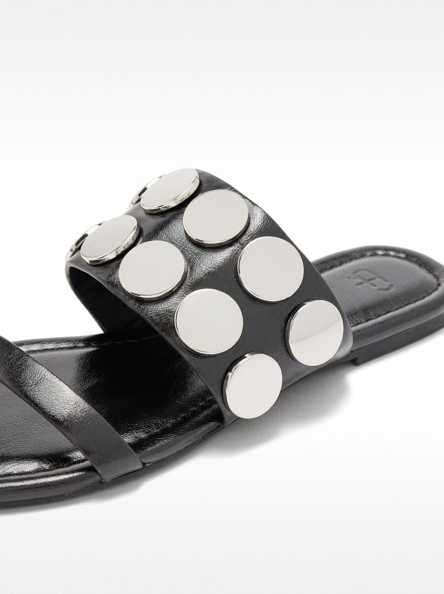 Flat sandals with metallic details