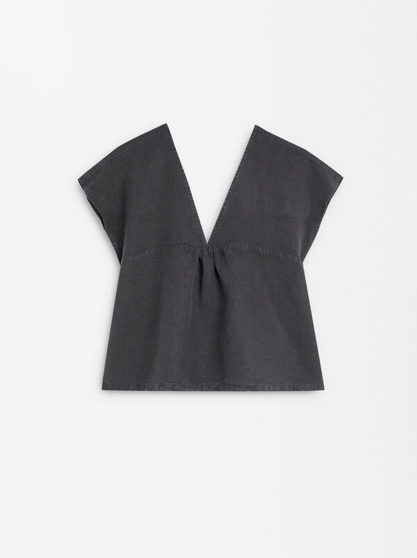 Top with linen and V-back