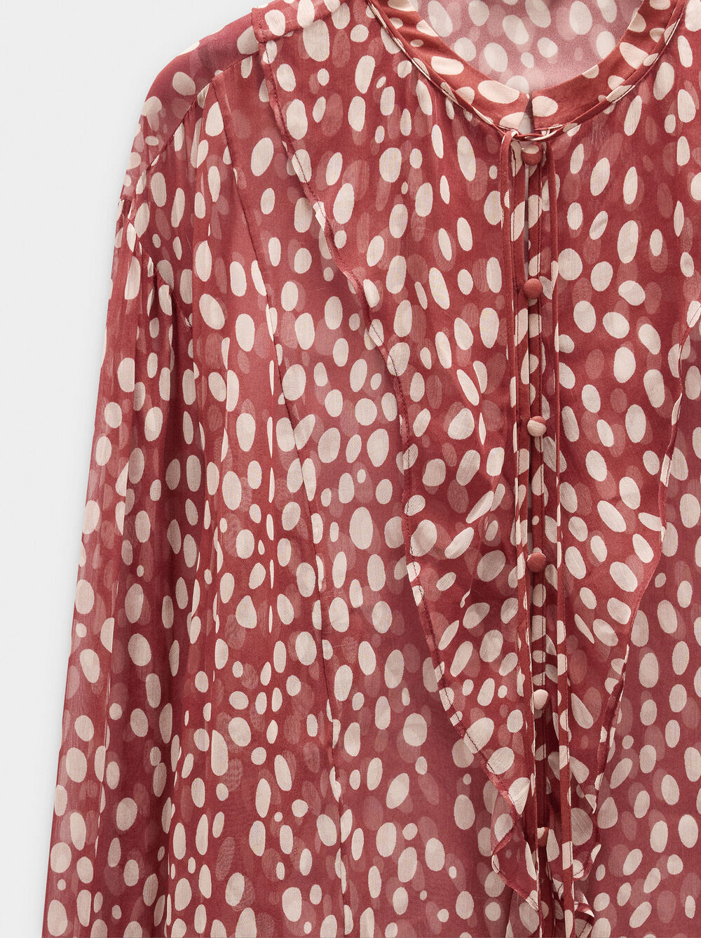 Blusa semitrasparente stampata
