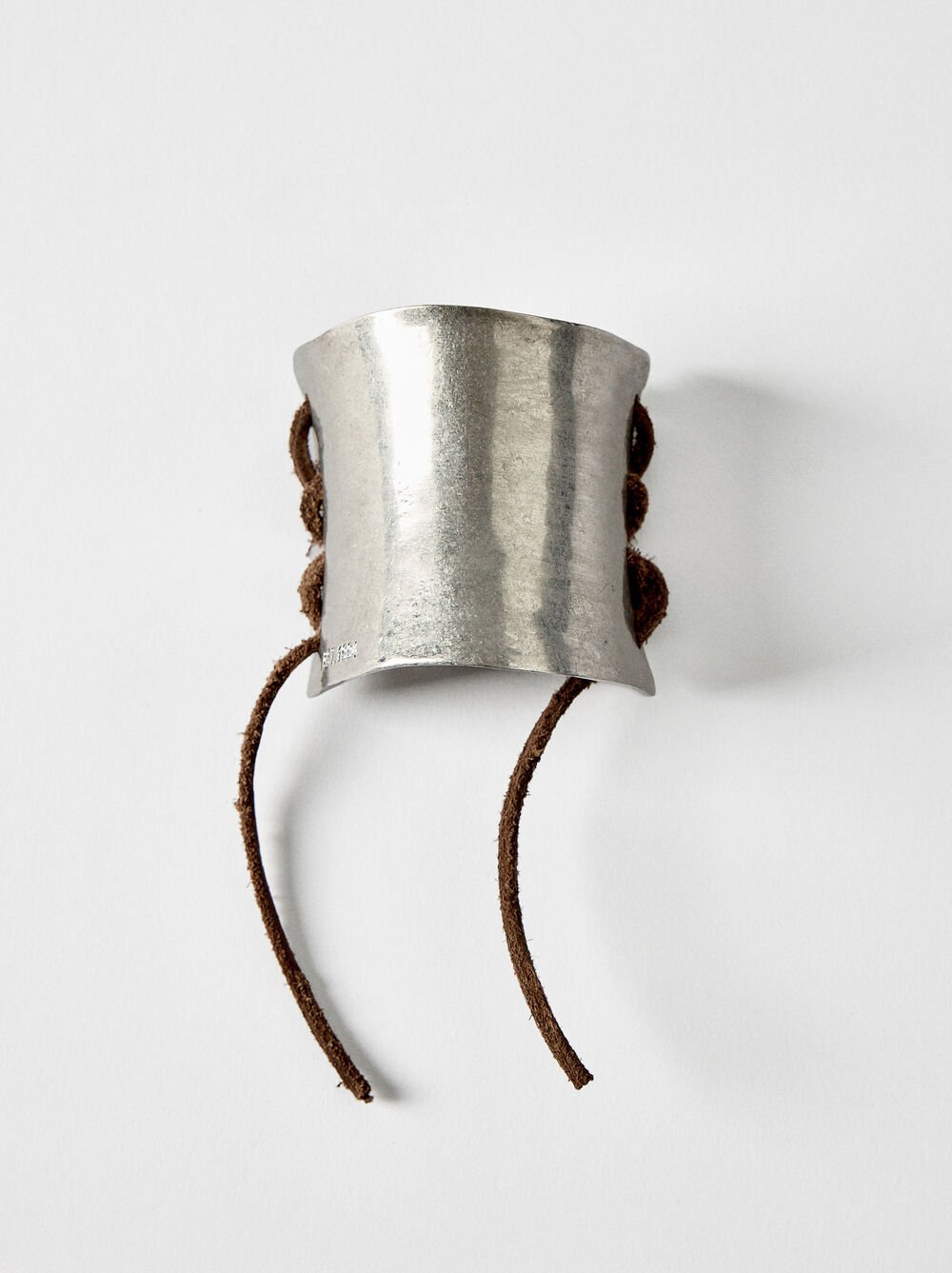 Wide bracelet with cords 