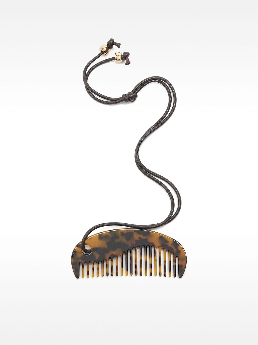 Necklace with comb-shaped pendant