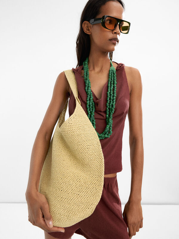 Straw-effect shoulder bag with side detail