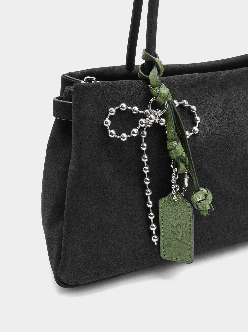 Leather-effect shoulder bag with pendant
