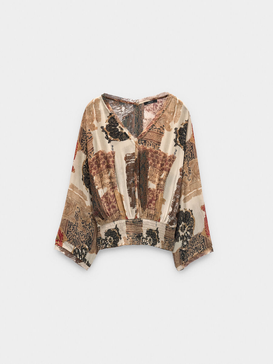 Blouse with semi-transparent print