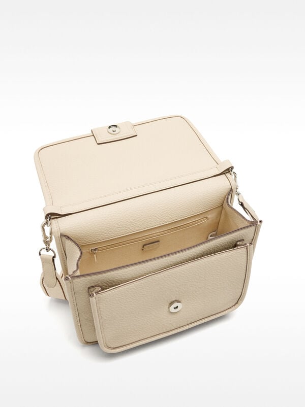 Crossbody bag with texture and flap closure