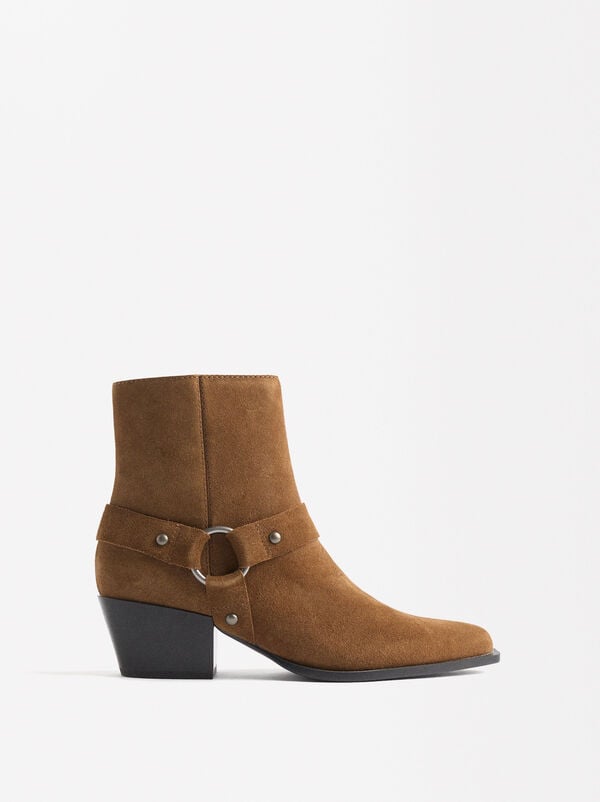 Cowboy leather ankle boots with ring and studs