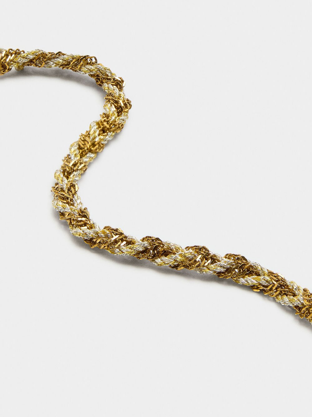 Intertwined bracelet with links and cord