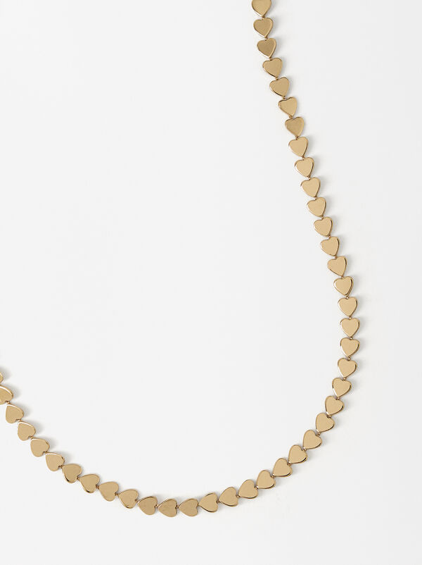 Golden necklace with hearts