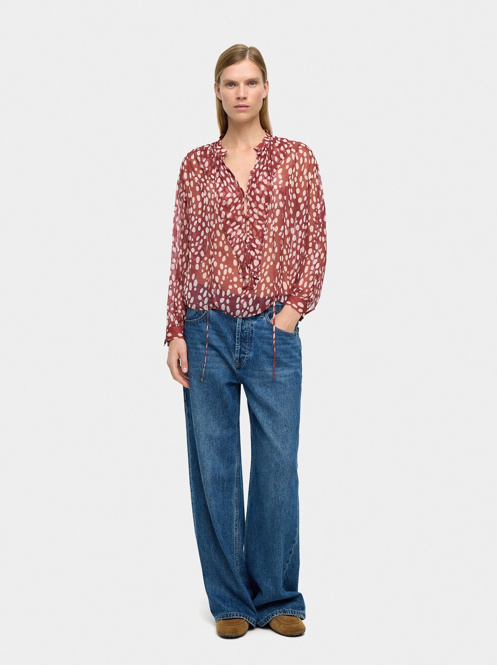 Blusa estampada semitransparente