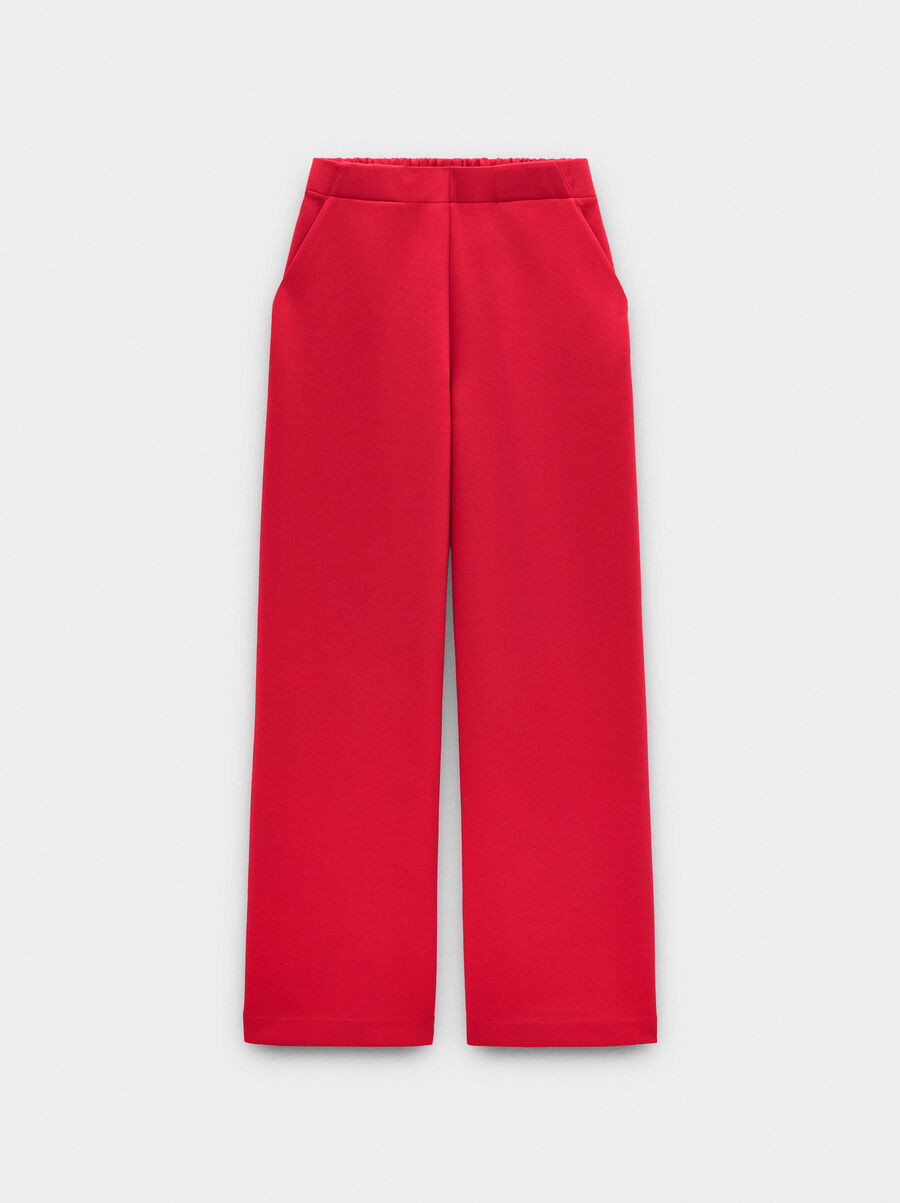 Elastic waist trousers with pockets