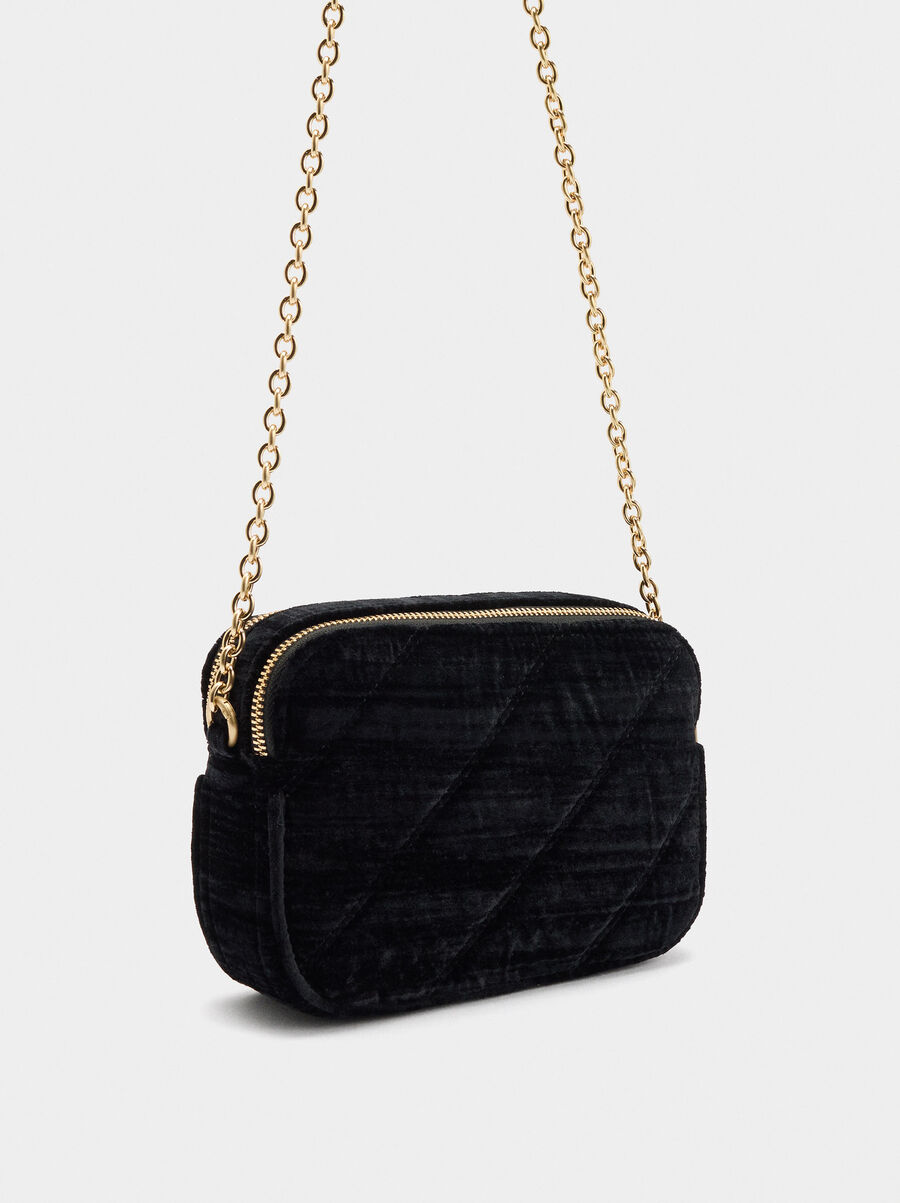 Bolso de fiesta aterciopelado con insectos