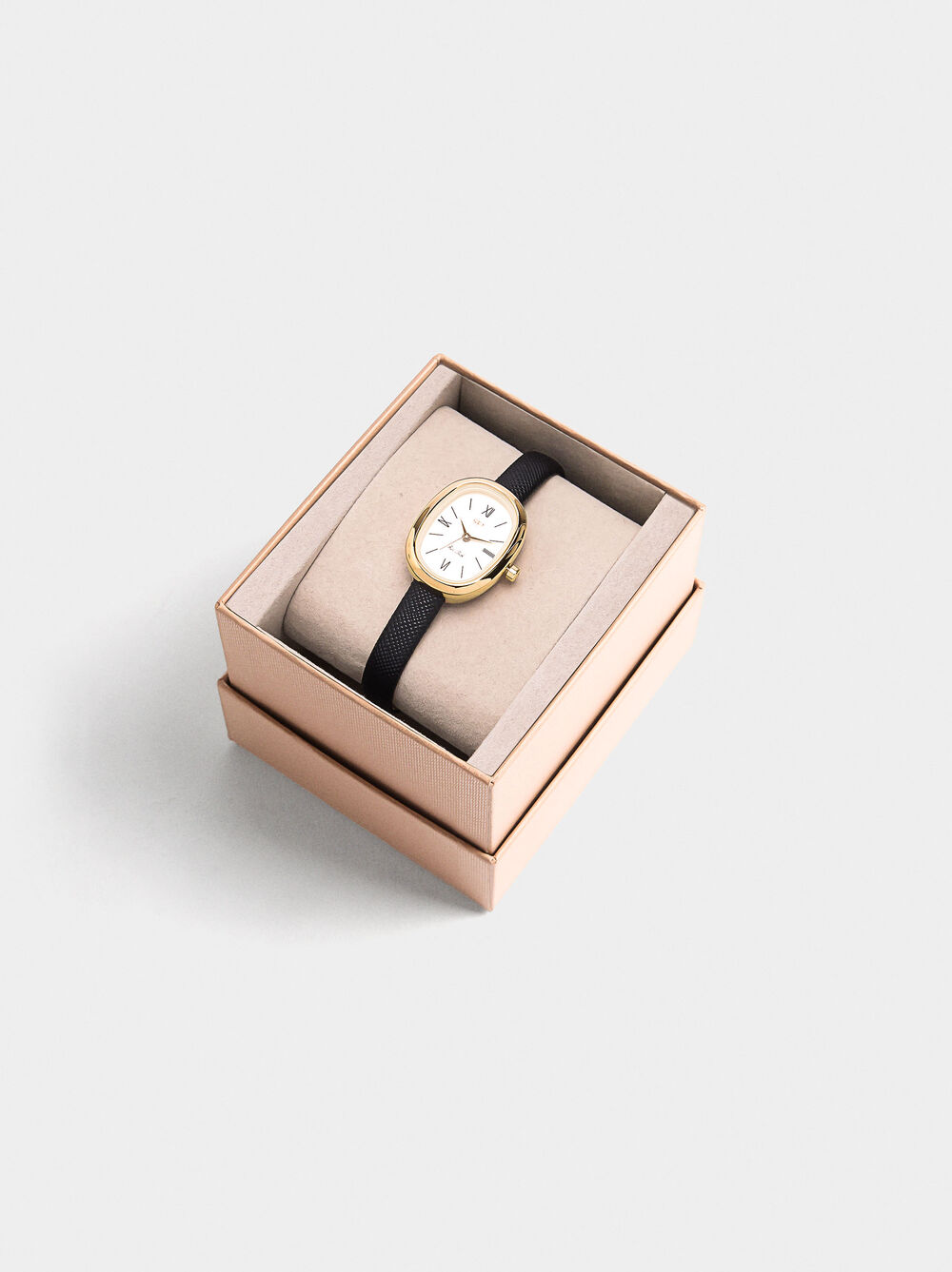 Oval watch with textured strap