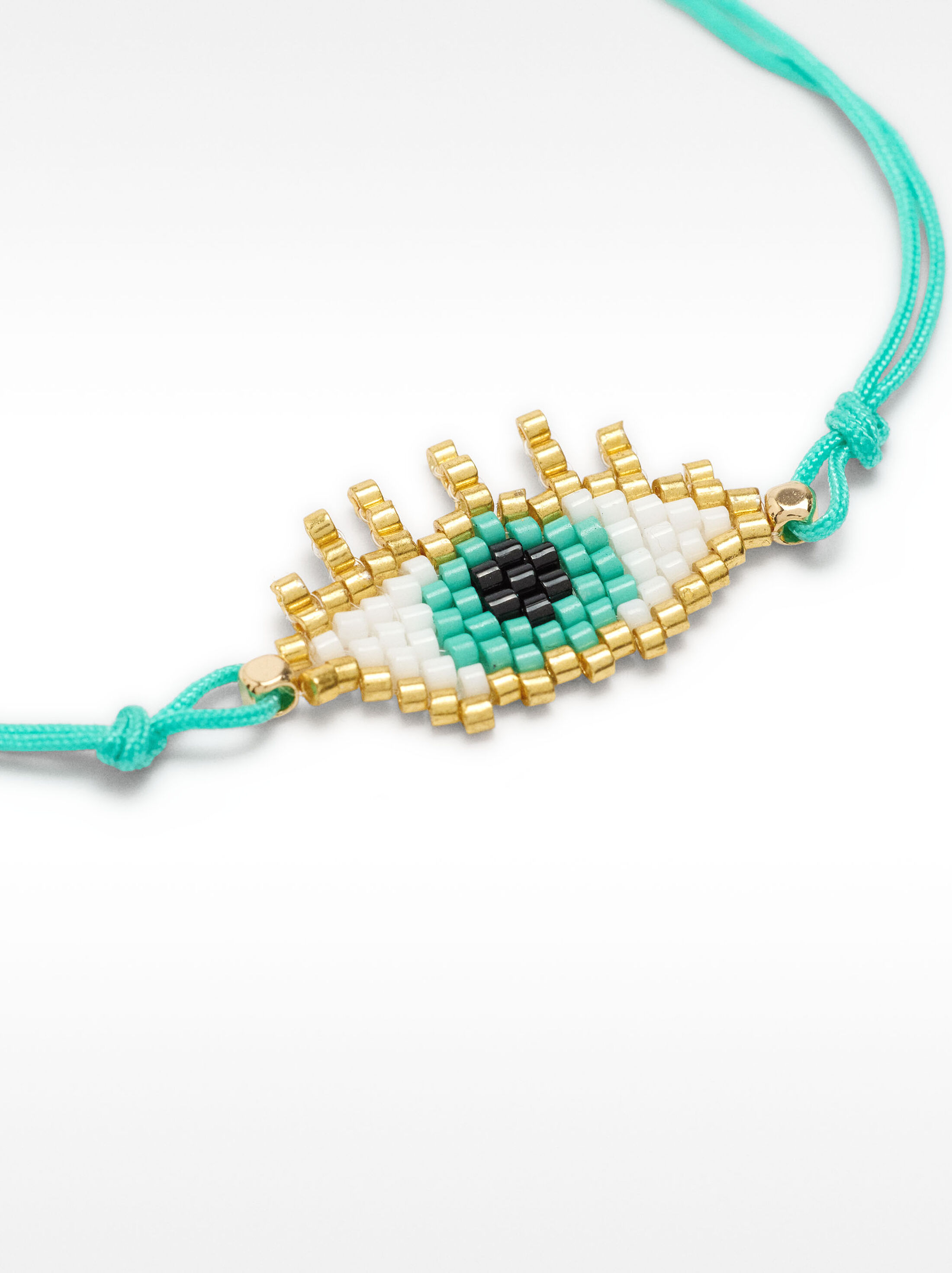 Adjustable bracelet with eye pendant image number 1.0