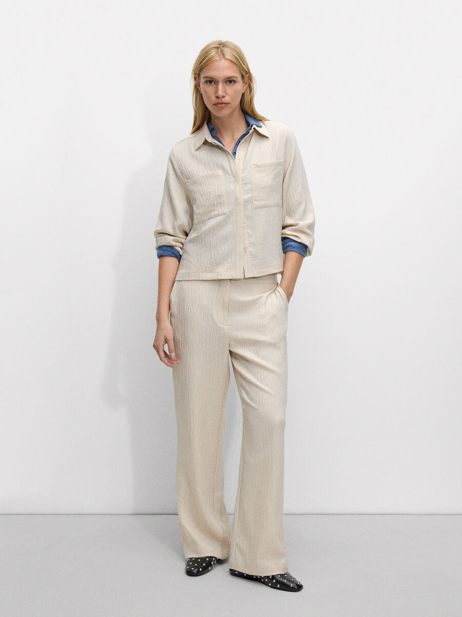 Flowy trousers with a crinkled effect