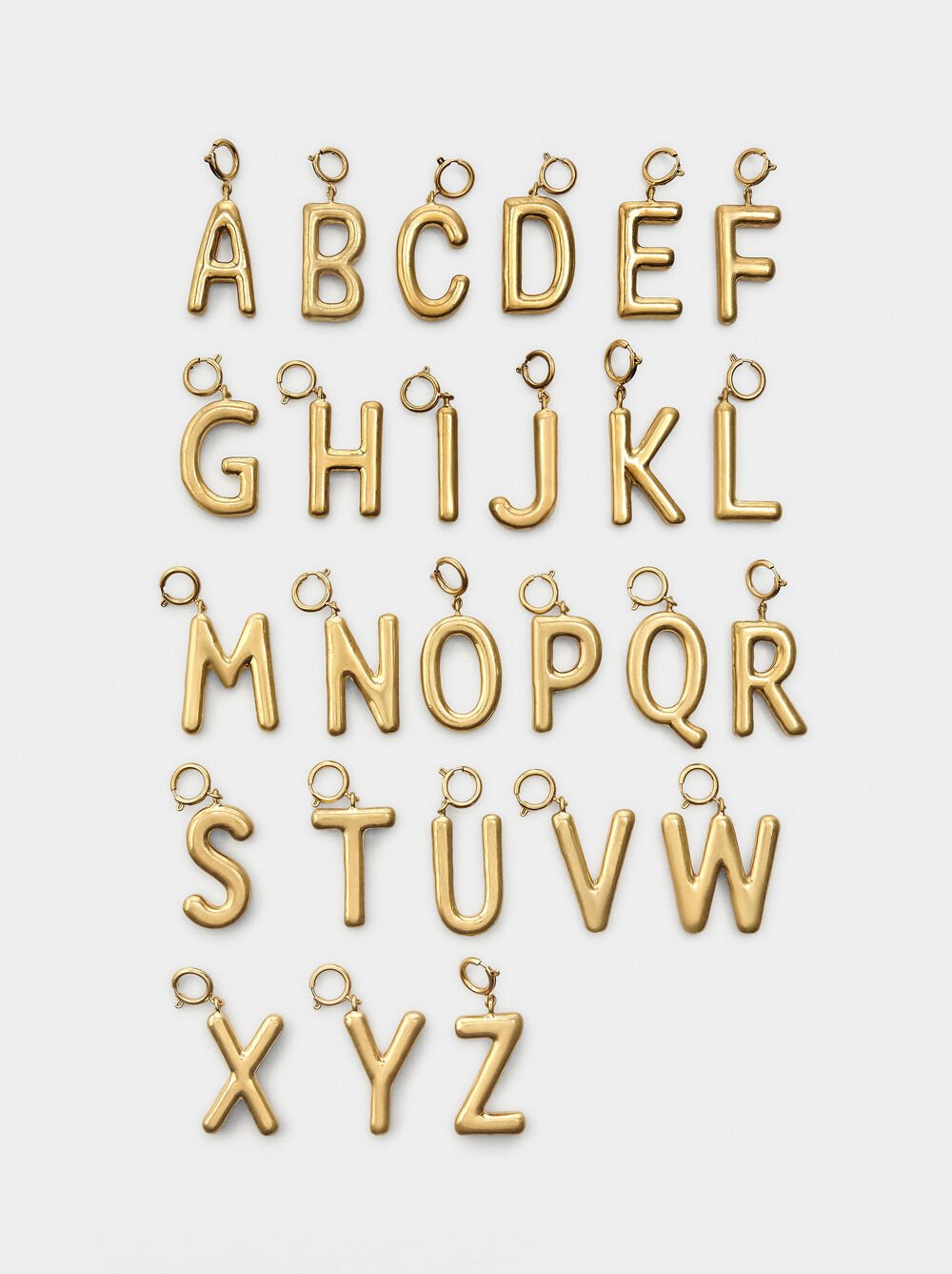 Charm con letra 