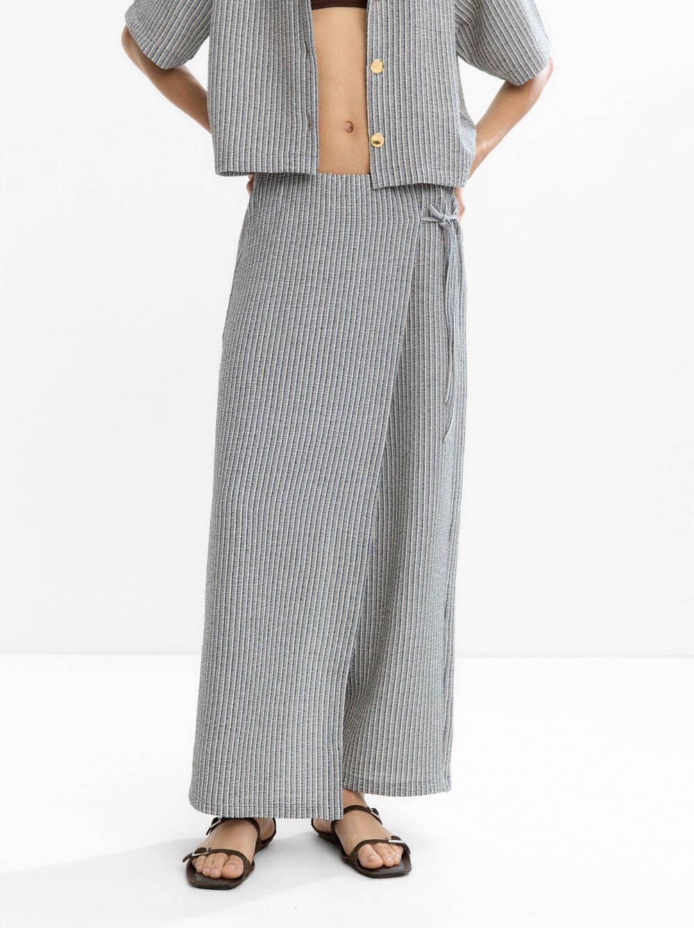 Striped crossover trousers