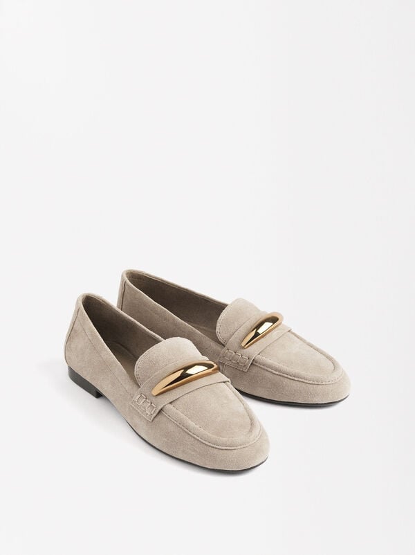 Leather moccasins with metallic detail