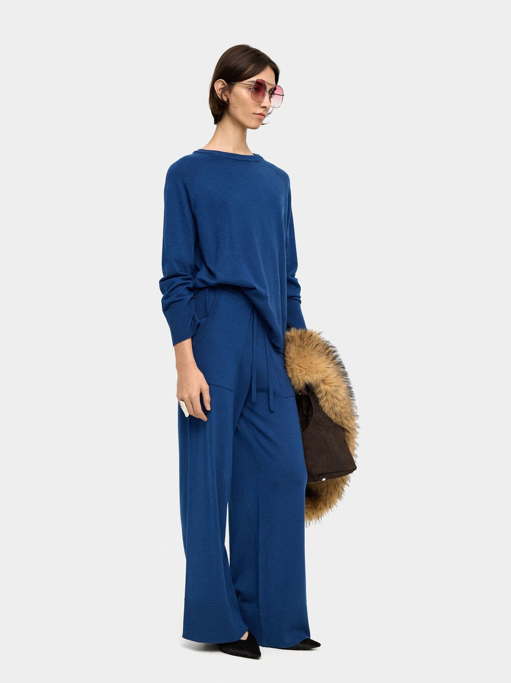 Adjustable knit trousers with cord