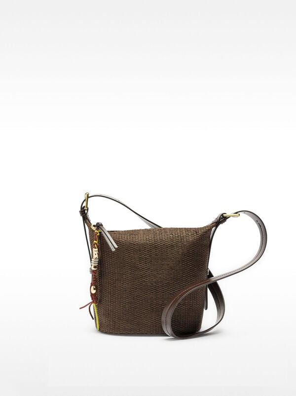 Shoulder bag with straw effect and pendant