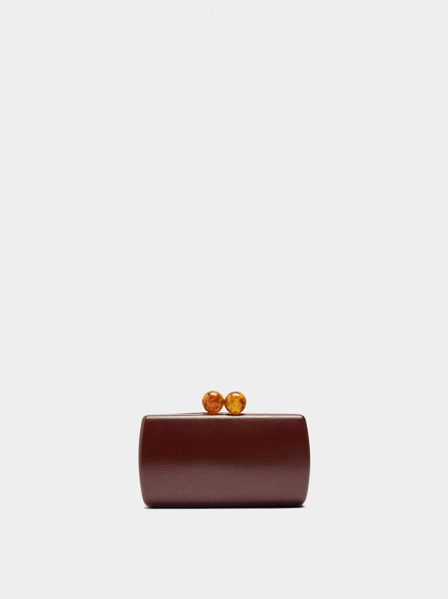 Party clutch with kiss-lock closure