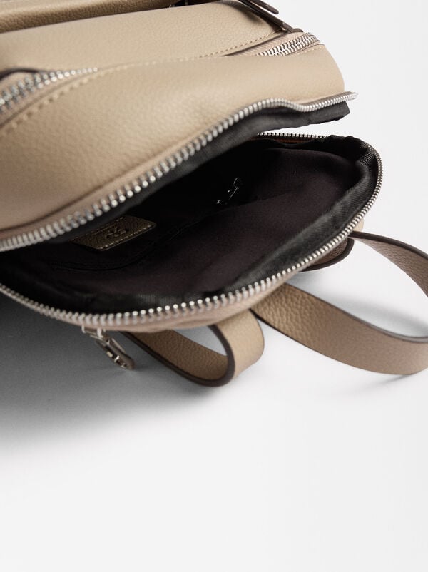 Textured backpack with pendant