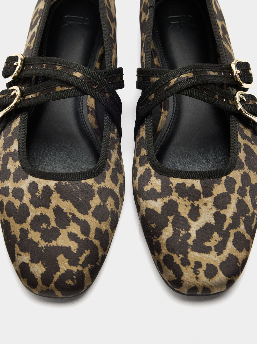 Ballet flats with animal printed fabric
