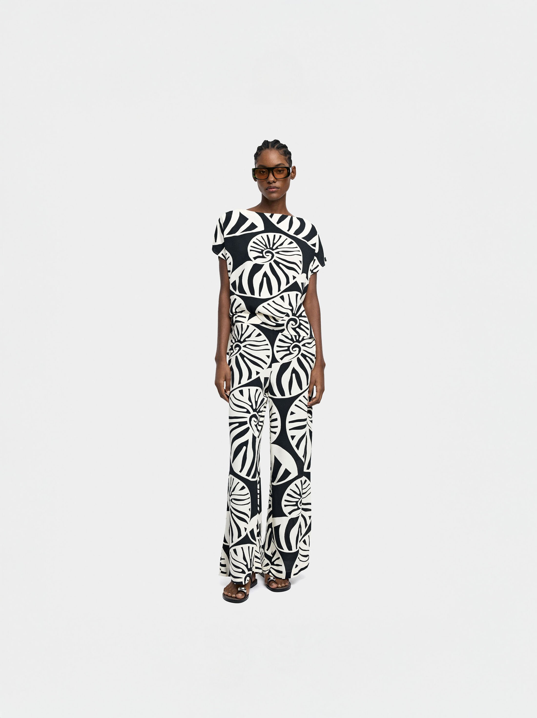 Printed fluid trousers image number 6.0