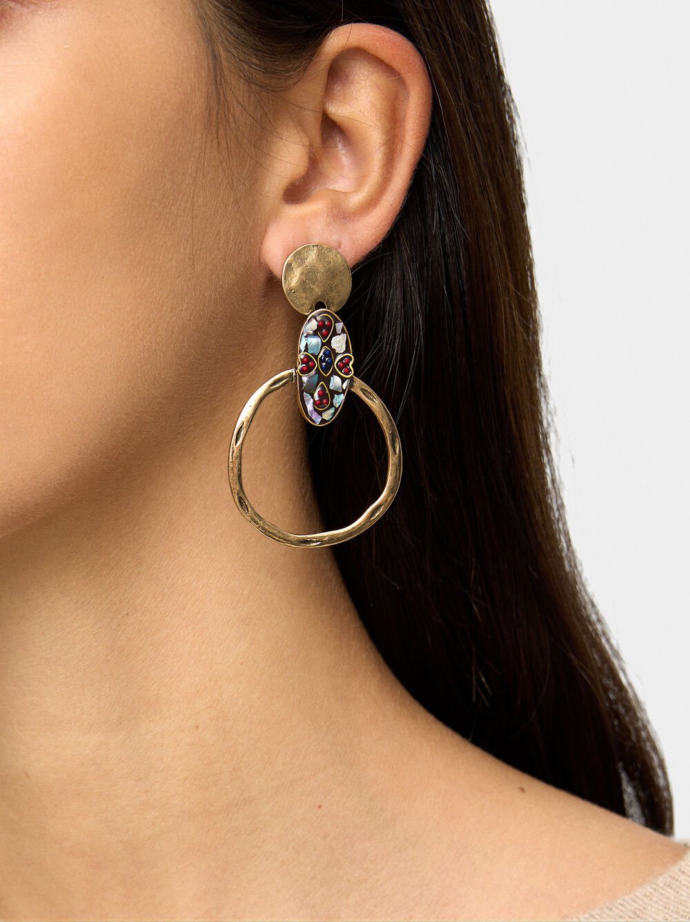 Long earrings with ethnic detail