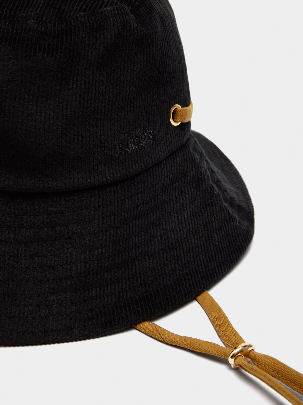 Bucket hat with adjustable strap
