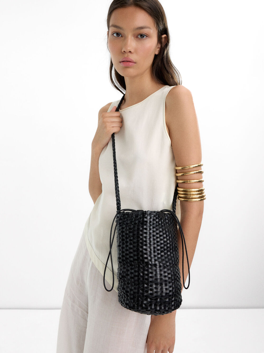 Braided leather bucket bag