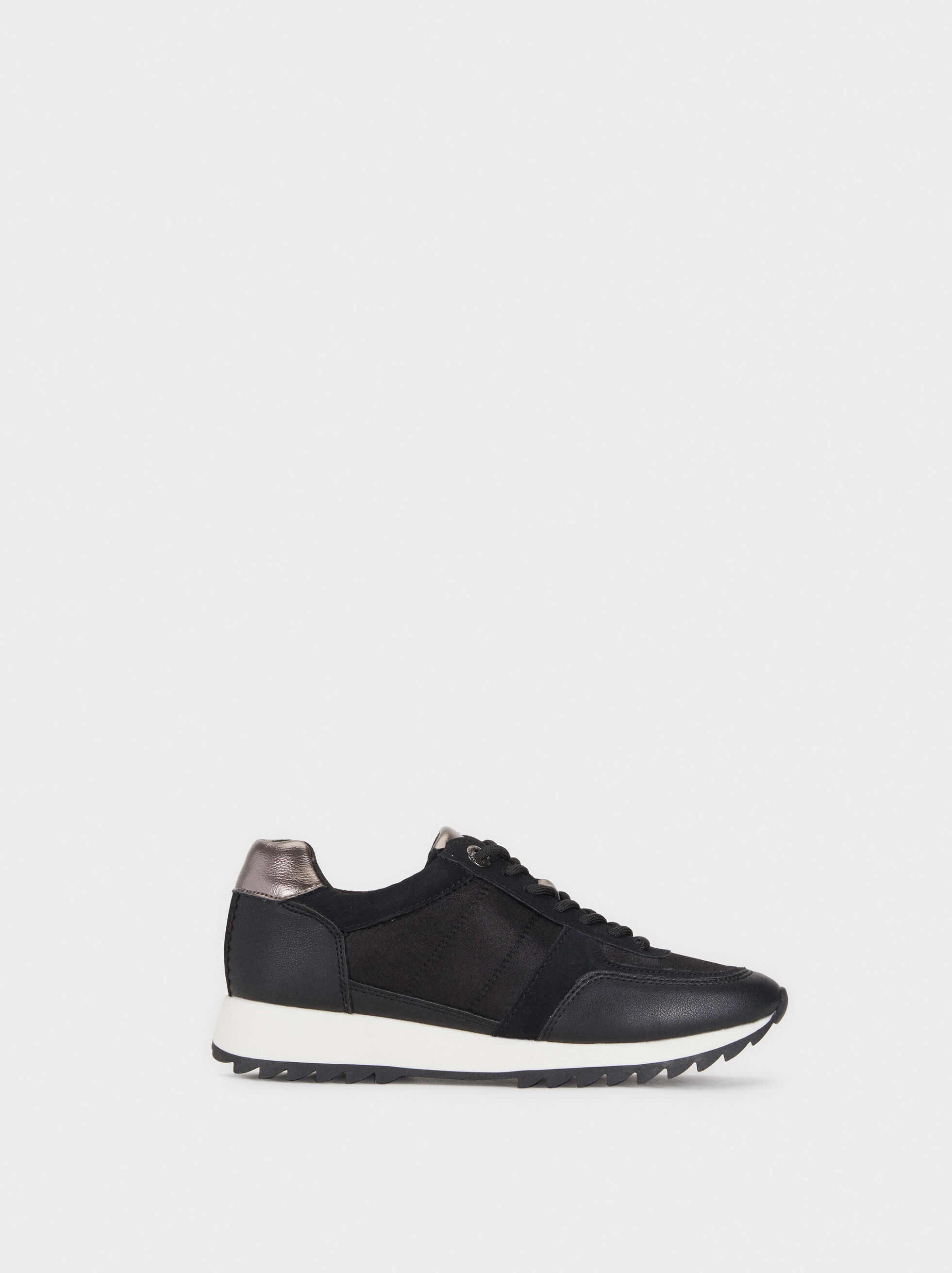 black trainers with white sole womens